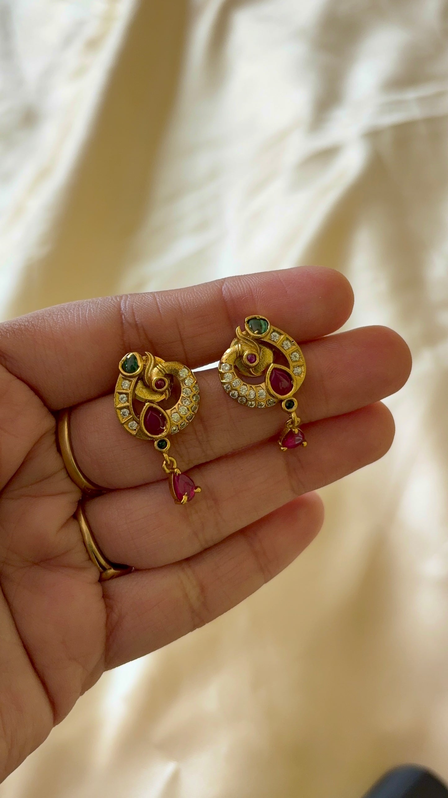 Antique finish peacock stud