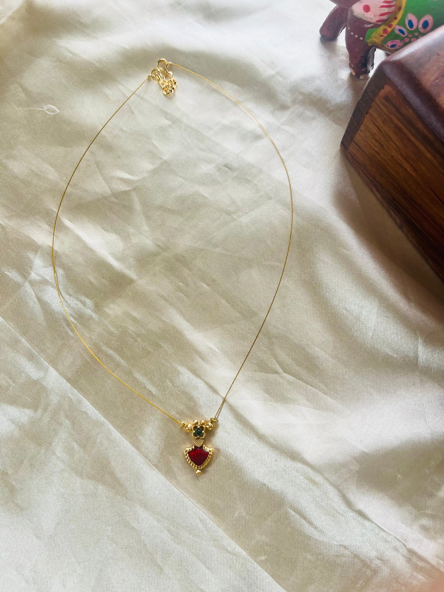 Palakka invisible necklace
