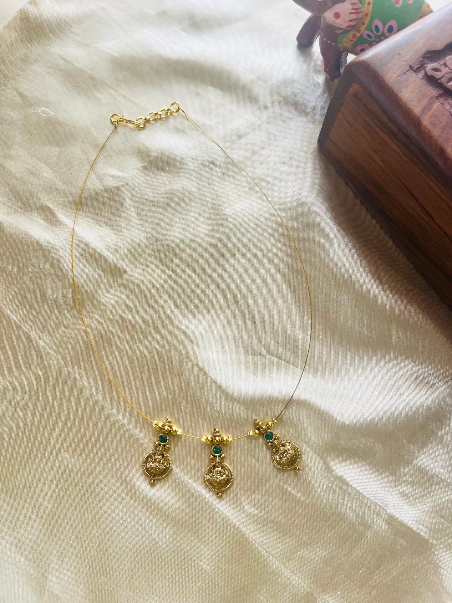 Lakshmi coin invisible necklace