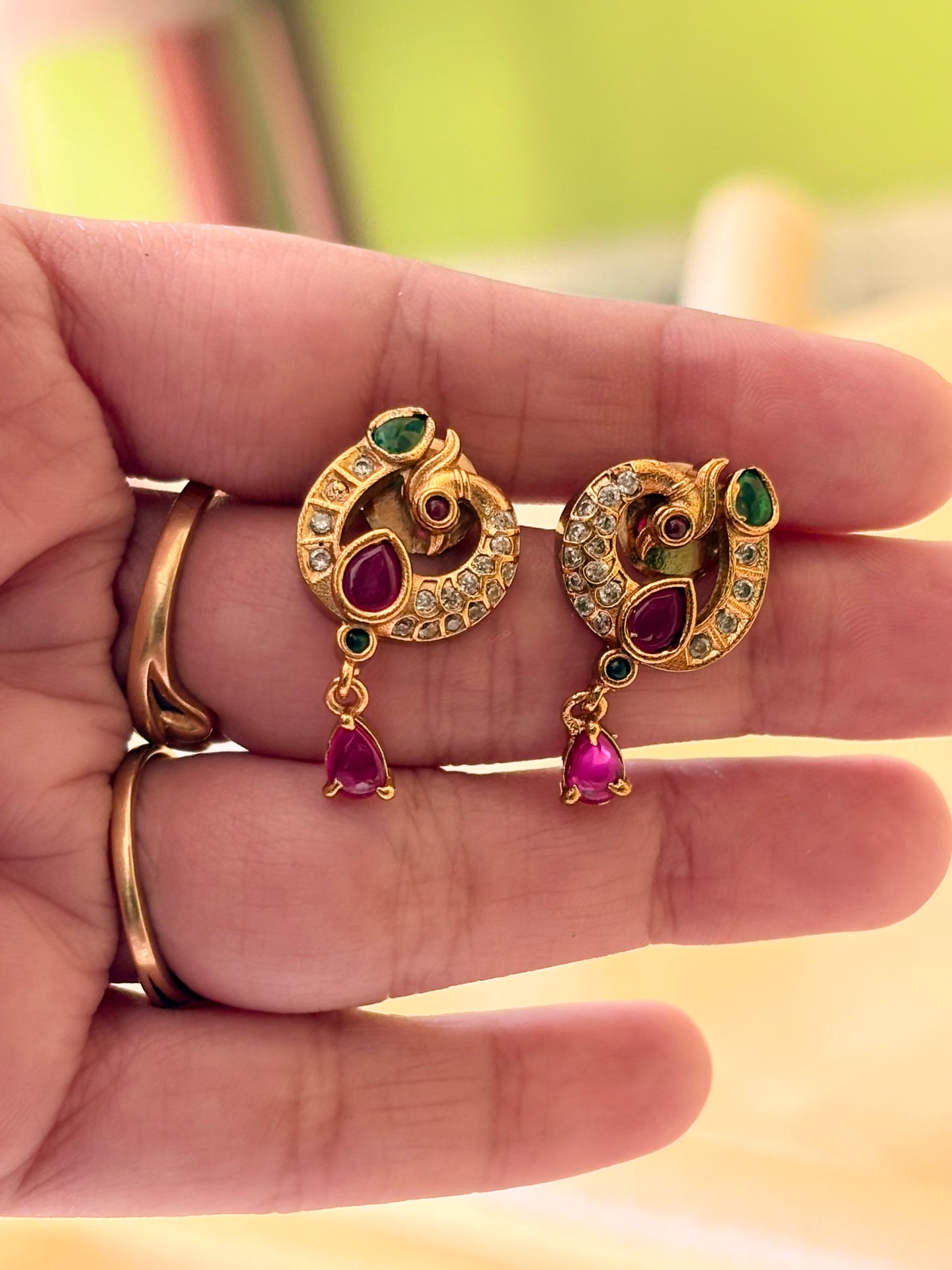 Antique finish peacock stud
