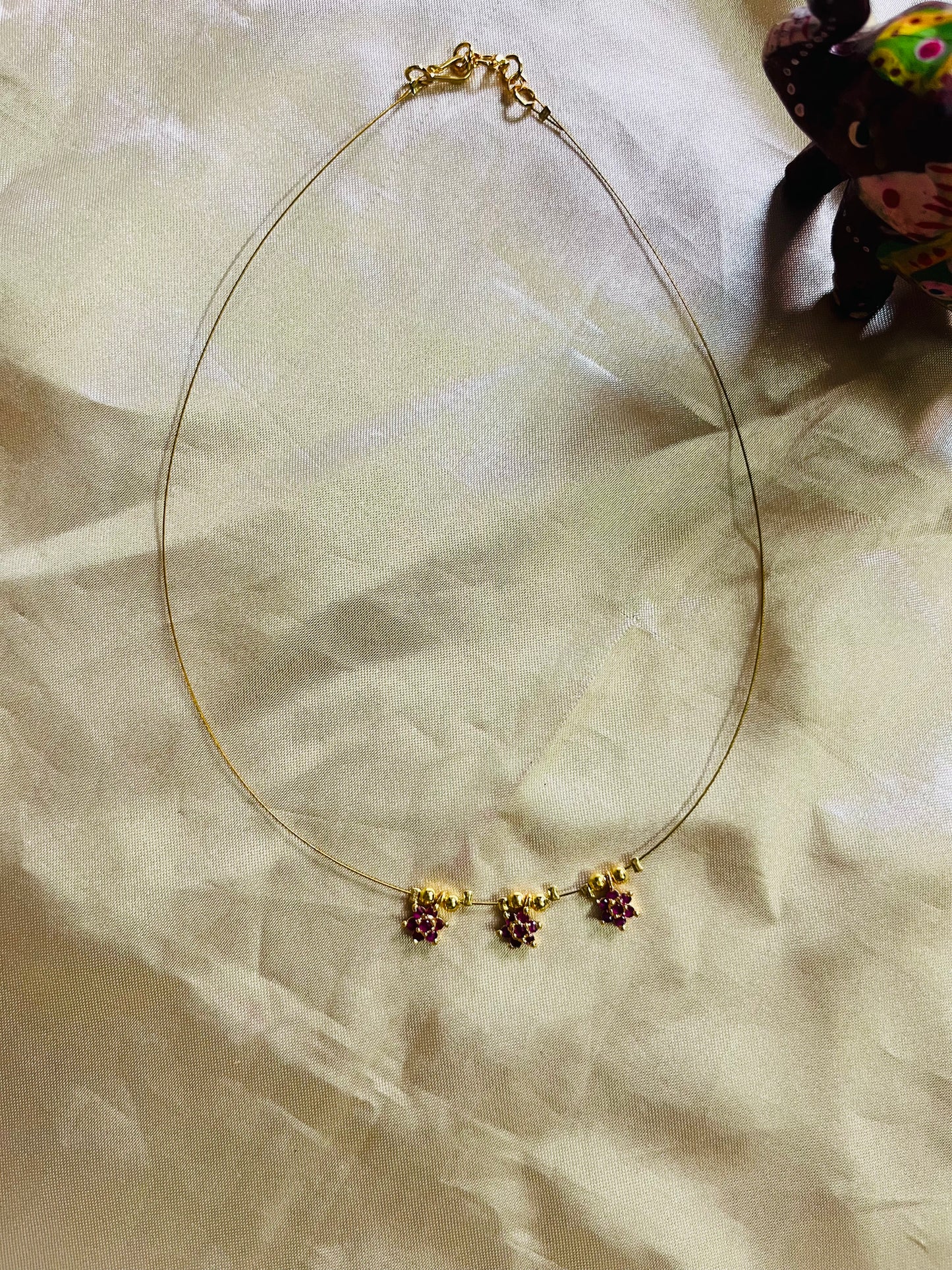 AD  floral invisible necklace (Ruby)