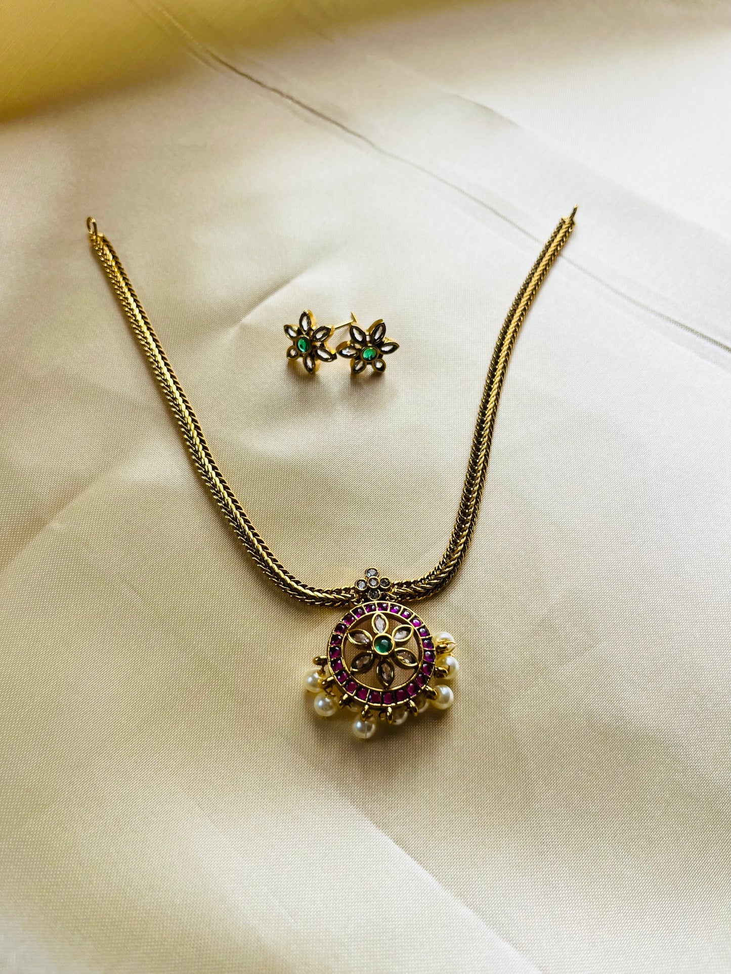 Antique Gold finish floral Attigai