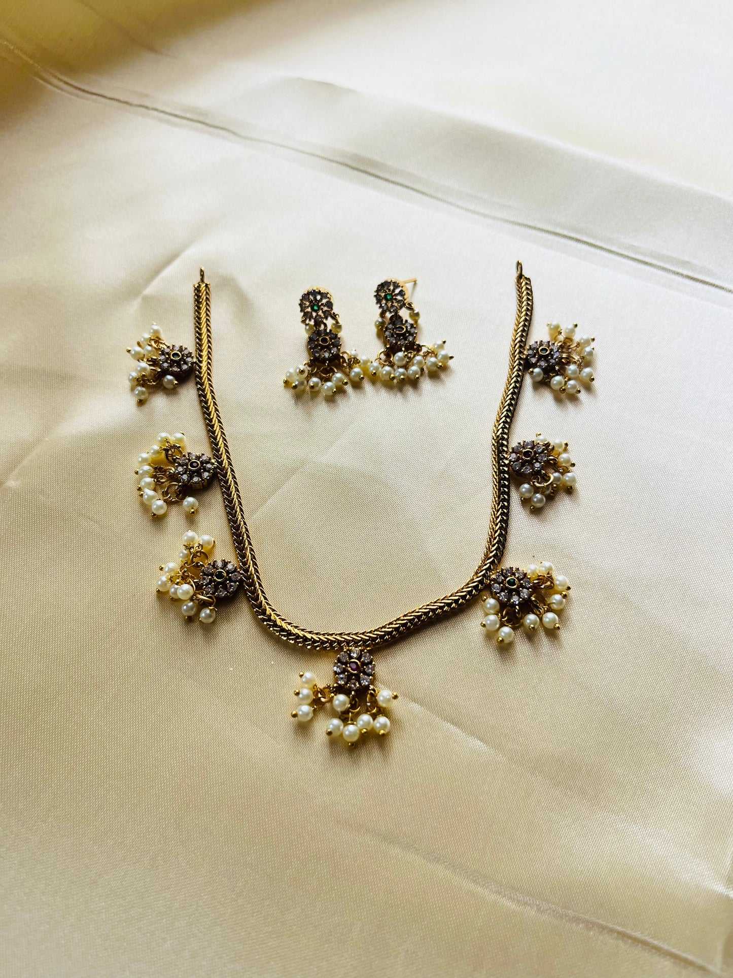 Antique Gold finish floral Attigai with pearl
