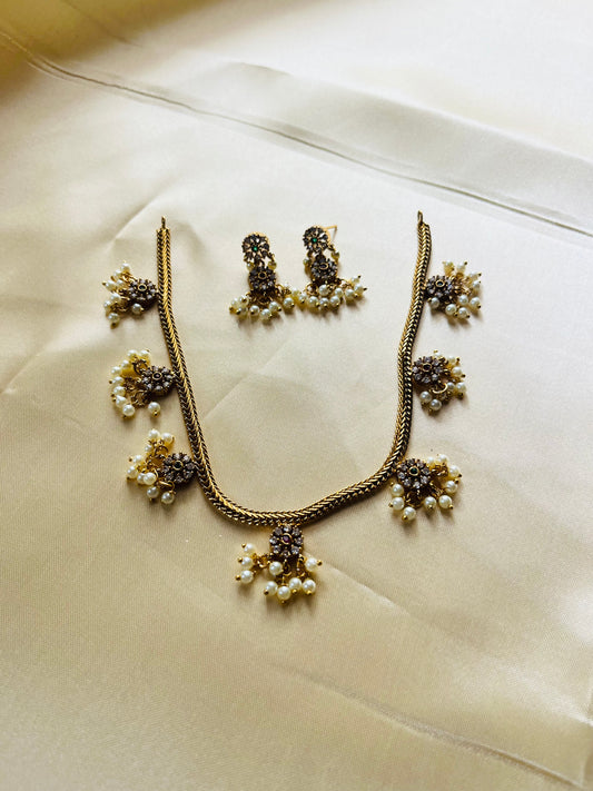 Antique Gold finish floral Attigai with pearl