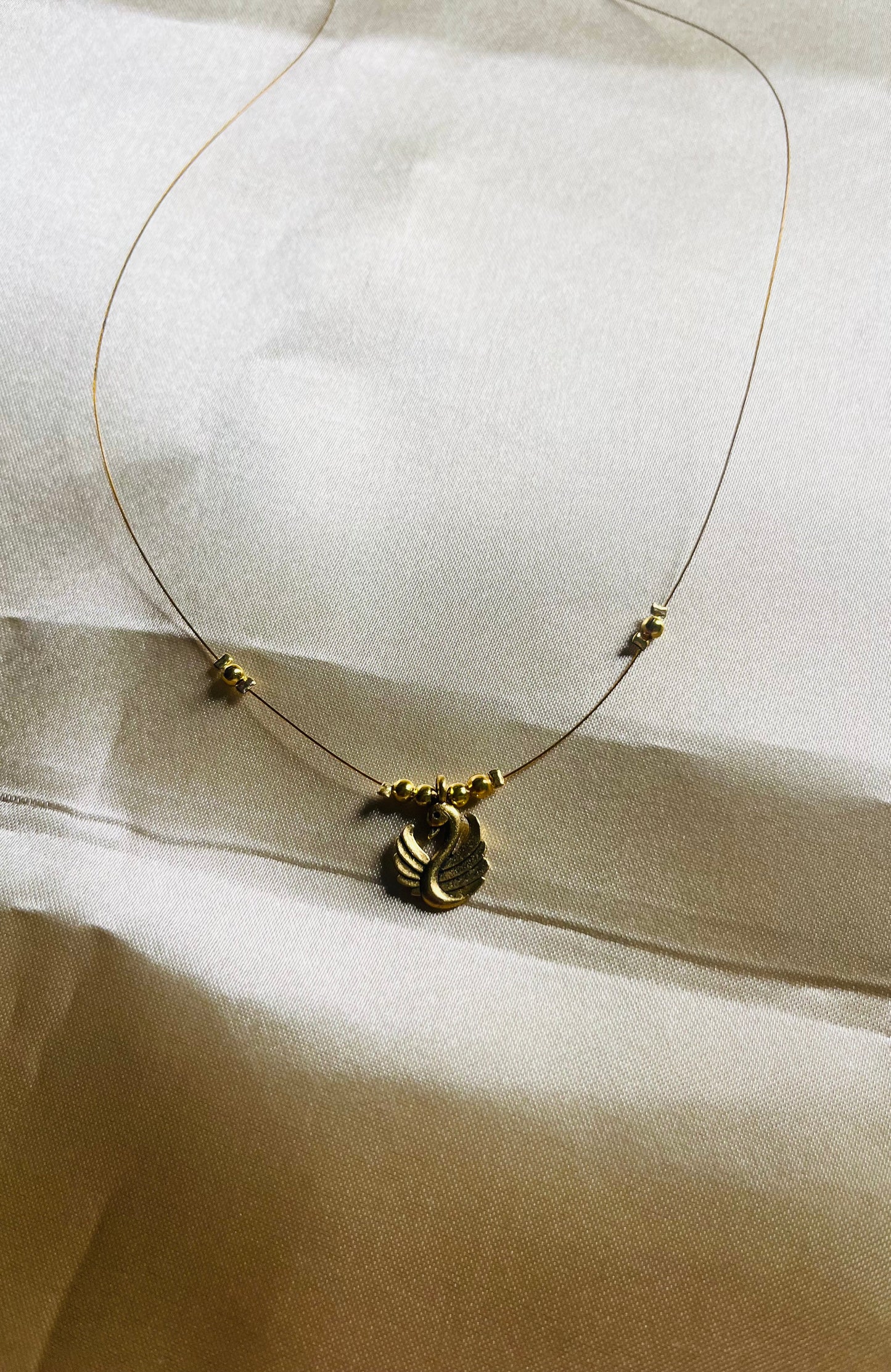 Oxidised Swan Invisible necklace