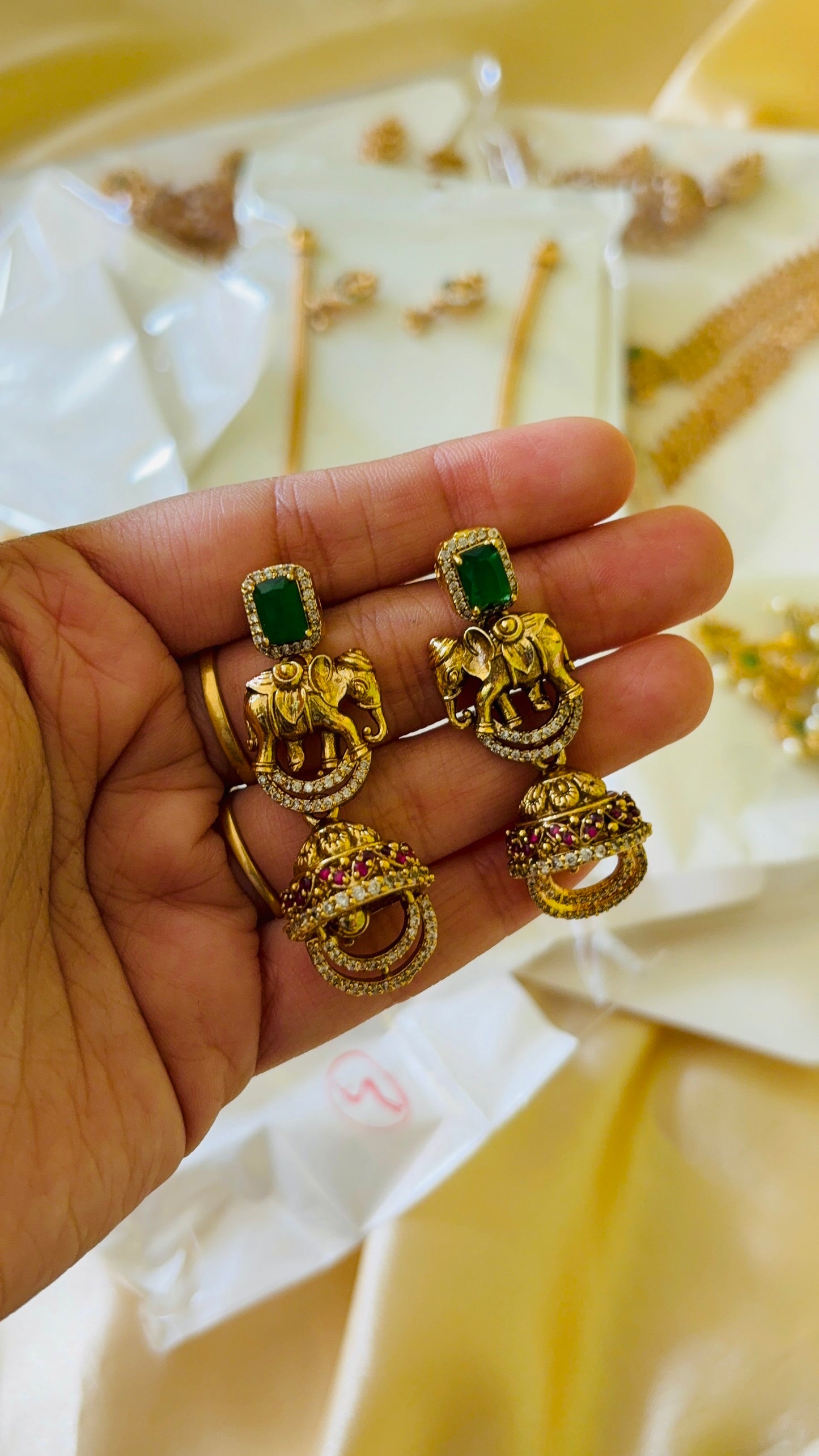 Emerald with elephant antique earring