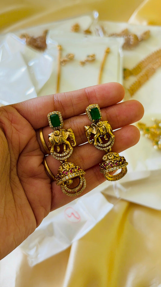 Emerald with elephant antique earring